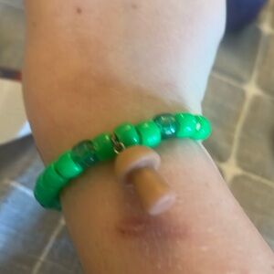 Mushroom Kandi bracelet with green beads